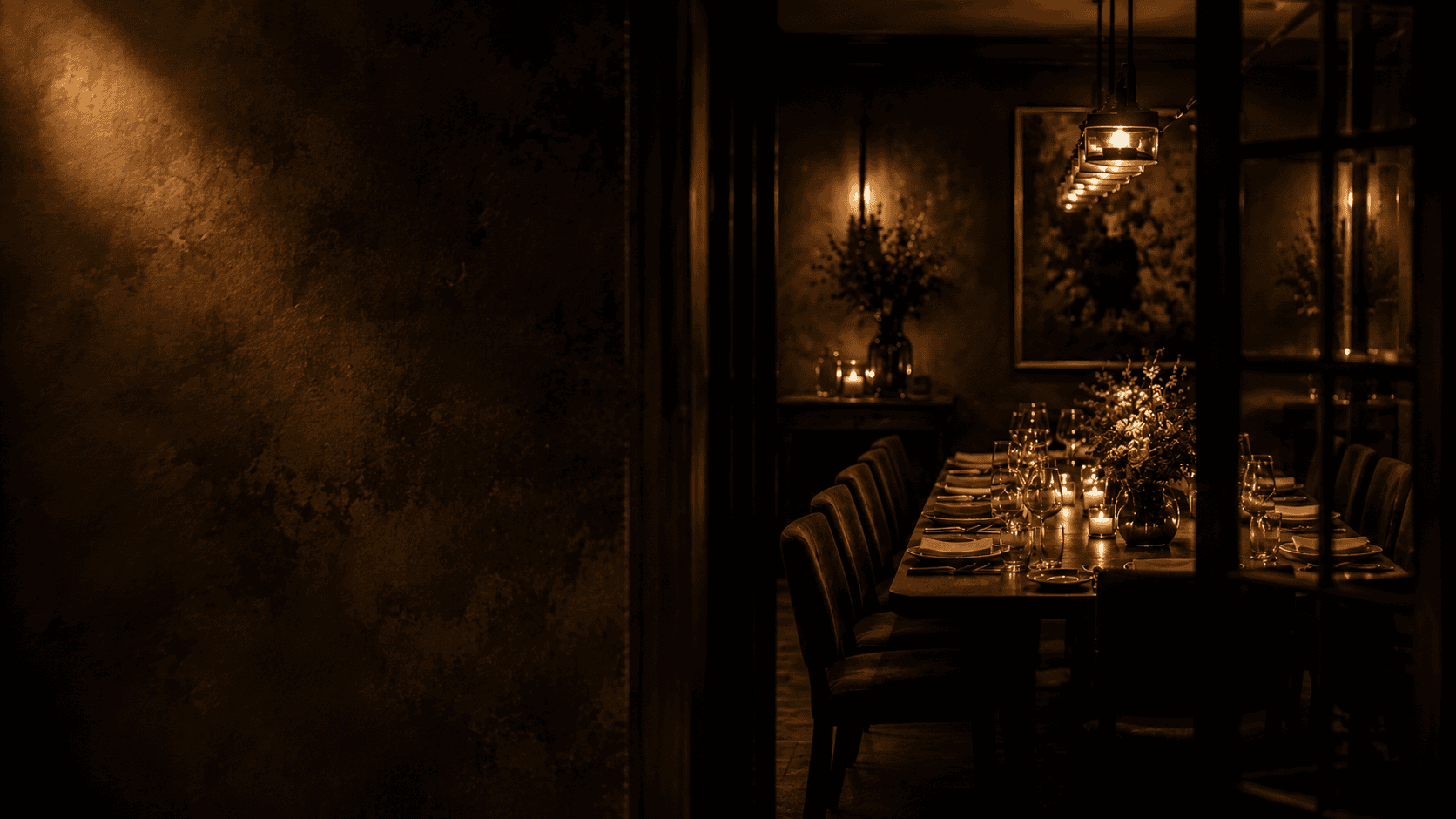 The private dining room, laid for a party of twelve